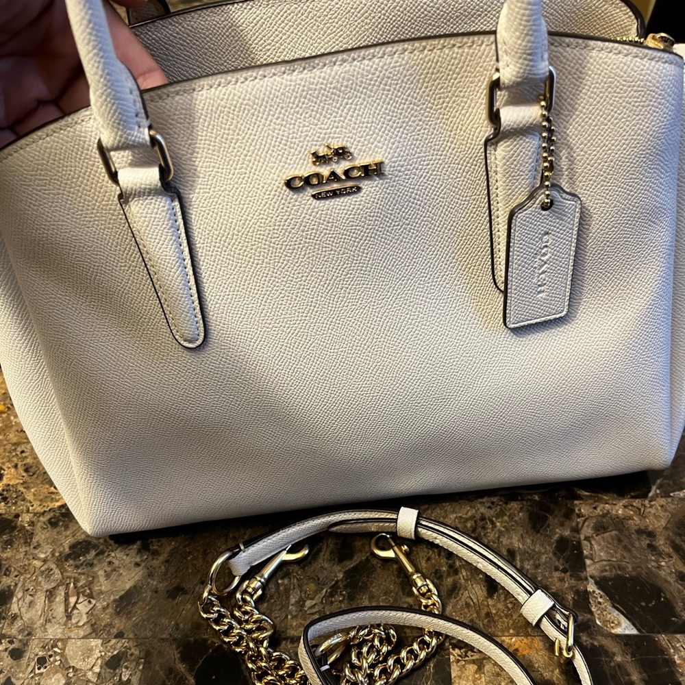 Coach crossbody purse. Off white color. No scratches or stains.